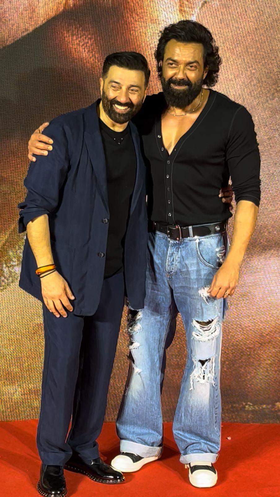 The flashbulbs went into a frenzy as the Deol brothers struck their pose, and fans couldn`t get enough of this heartwarming moment.